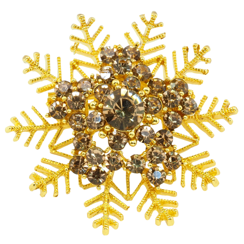 Брошка Сніжинка з коричневими стразами фото №1 Брошка Сніжинка з коричневими стразами фото №1