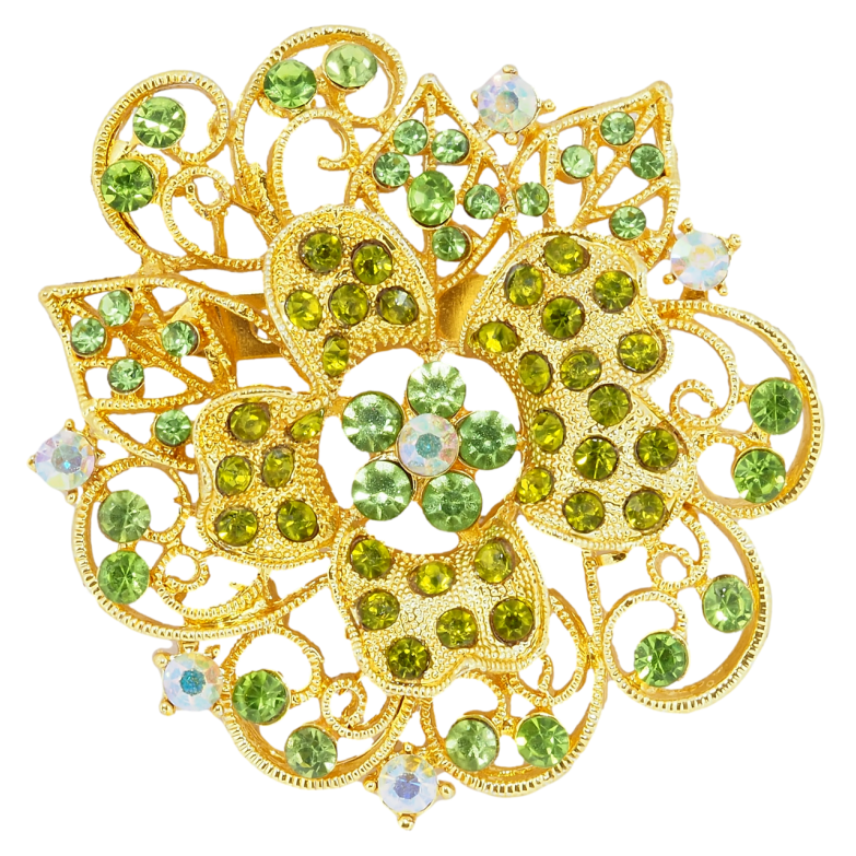 Брошь Цветок с зелеными стразами фото №1 Брошь Цветок с зелеными стразами фото №1