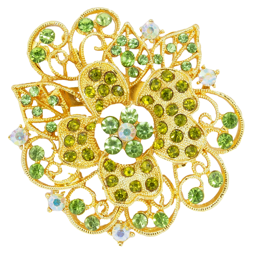 Брошь Цветок с зелеными стразами фото №1 Брошь Цветок с зелеными стразами фото №1