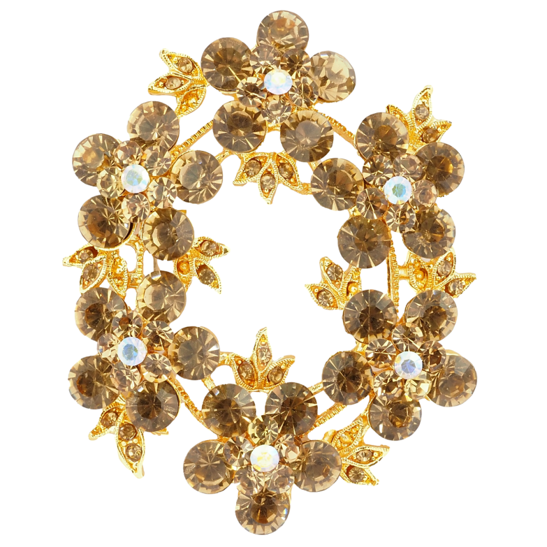 Брошка Віночок з золотистими стразами фото №1 Брошка Віночок з золотистими стразами фото №1