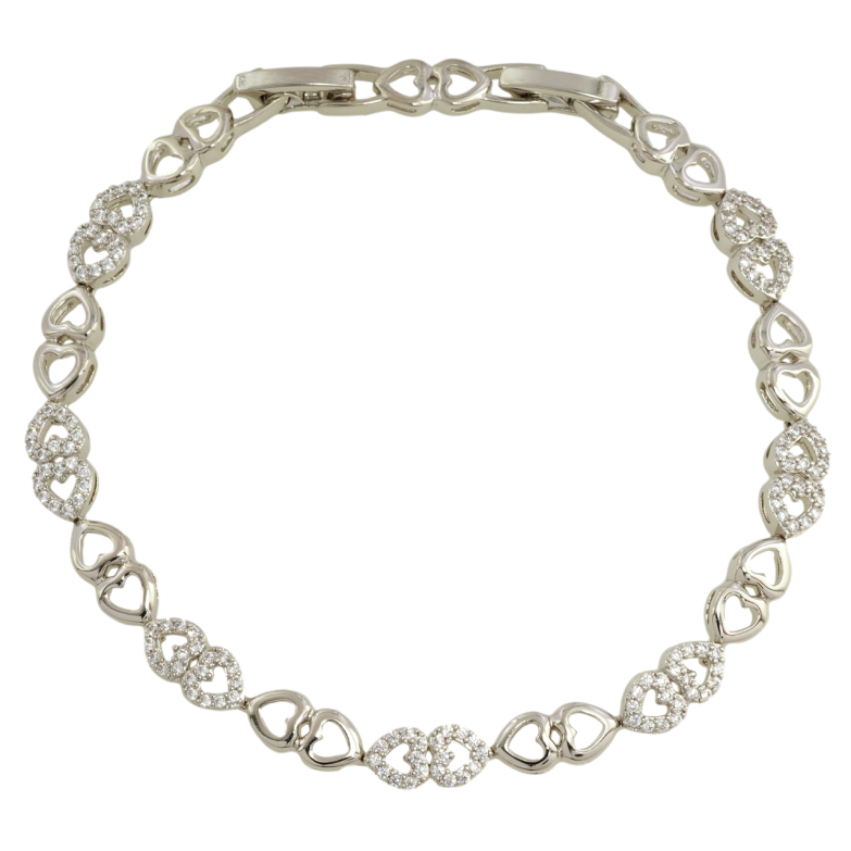 Браслет Xuping Родій Ланки сердечки з цирконієм довжина з дод. замком 17,19см х 5мм фото №1