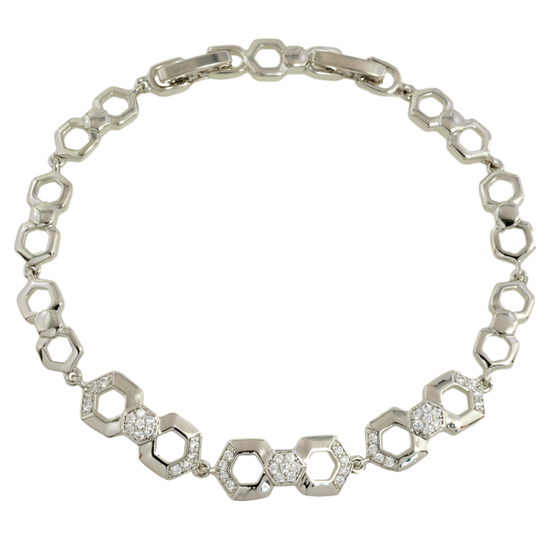 Браслет Xuping Родій Фігурні ланки з цирконієм довжина з дод. замком 17.5,19.5см х 6-8мм фото №1