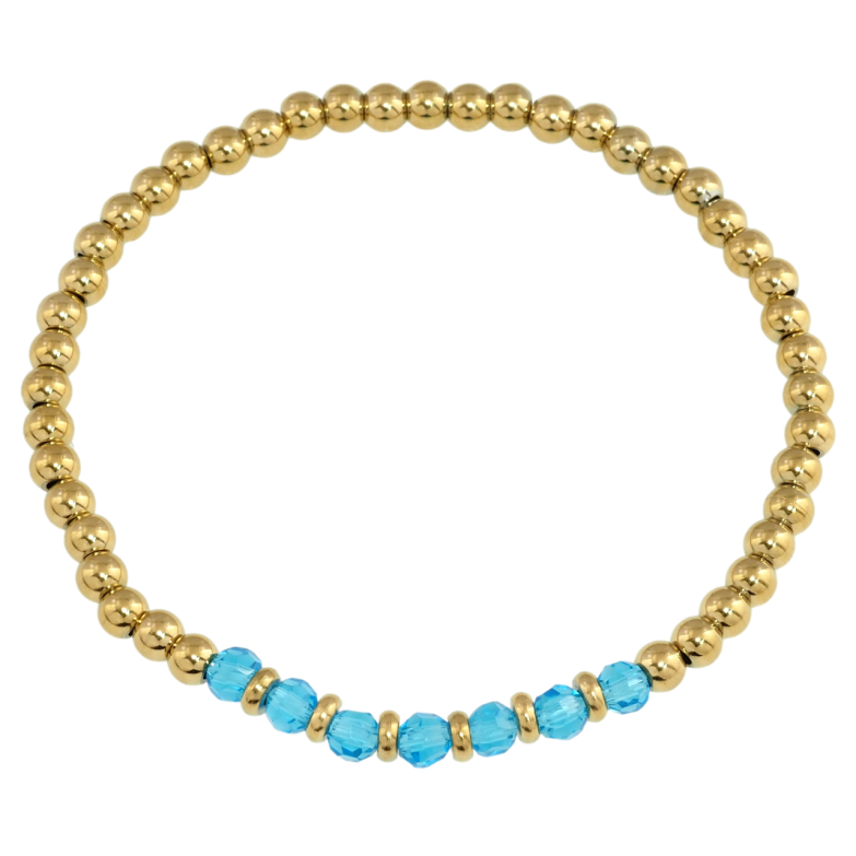Браслет Xuping TTM Stainless Steel цвет 14K Золотистые и голубые бусины на резинке размер 17-20см х 4мм фото №1