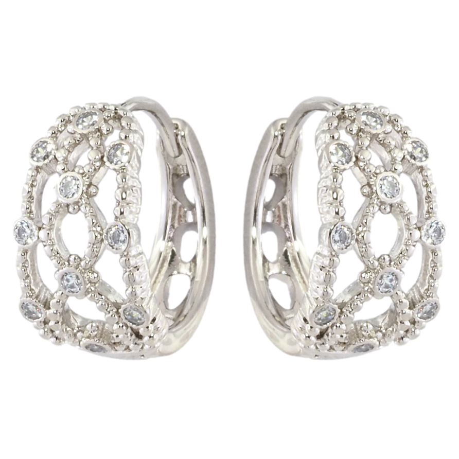 Сережки Xuping Родій колечка Візерунок з вставками цирконію фото №1