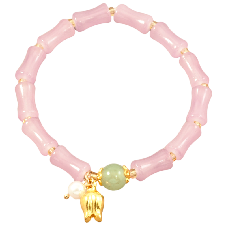 Браслет на гумці скло «Декоративні рожеві намистини з підвісками, ø 6мм» вільний розмір фото №1