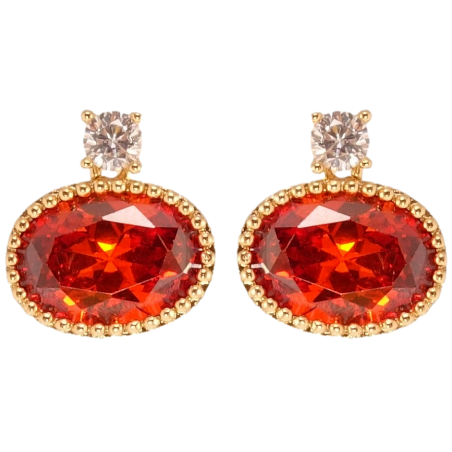 Сережки Xuping QQMM Позолота 18K пусети Овальні червоні кристали фото №1 Сережки Xuping QQMM Позолота 18K пусети Овальні червоні кристали фото №1