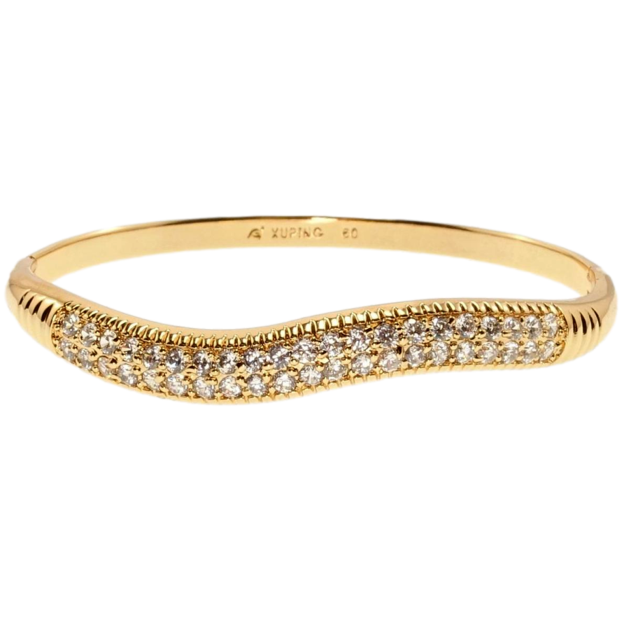 Браслет Xuping Позолота 18K Хвиляста доріжка цирконію ø 5,8см фото №1 Браслет Xuping Позолота 18K Хвиляста доріжка цирконію ø 5,8см фото №1