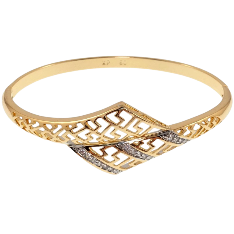 Браслет Xuping Позолота + Родий Резной меандровый орнамент с дорожками циркония ø 6см фото №1